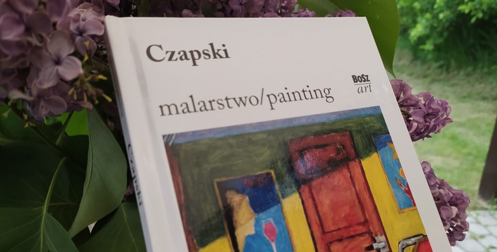 kolorowe zdjęcie z książką z reprodukcjami dzieł Czapskiego